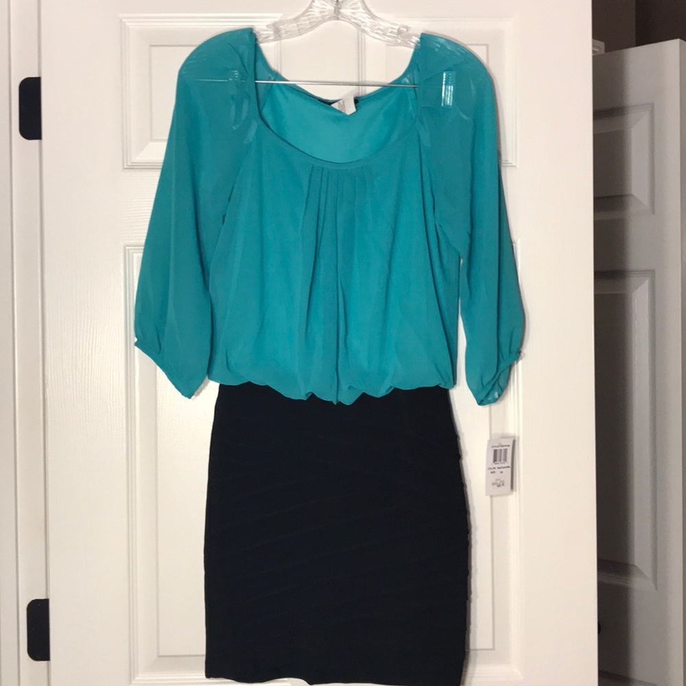 Sea foam green/black cocktail dress. 3/4 sleeves.